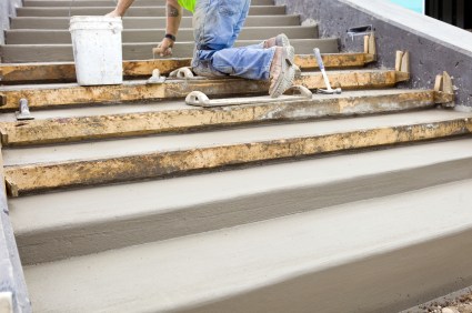 Nick's Construction and Masonry LLC mason building cement steps in Harwinton, CT.